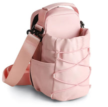 bolsa crossbody com base magnética que segura sua garrafa, celular e mais — enquanto você foca no treino.
